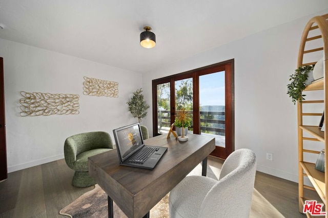 office space with french doors and hardwood / wood-style flooring