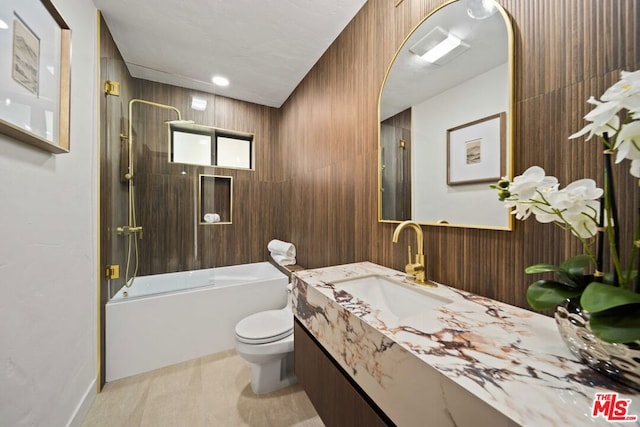 full bathroom featuring toilet, vanity, and shower / bathing tub combination