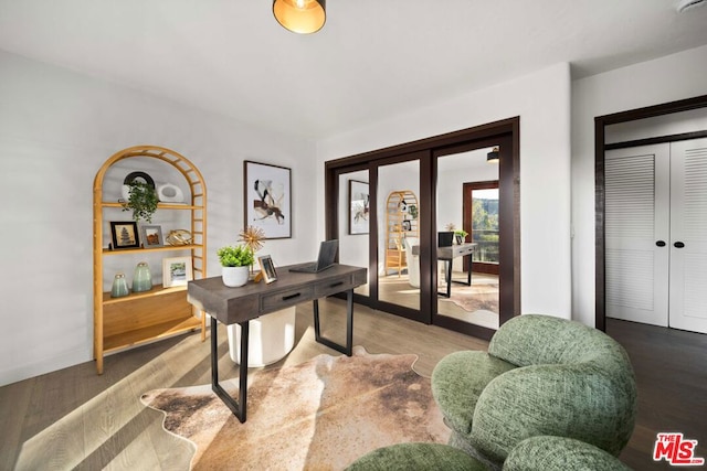 office area featuring wood-type flooring and french doors