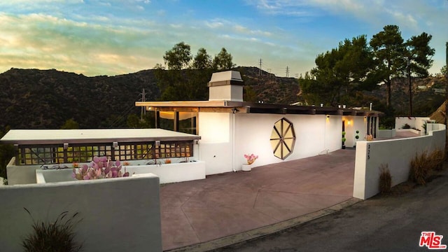 view of front facade with a mountain view