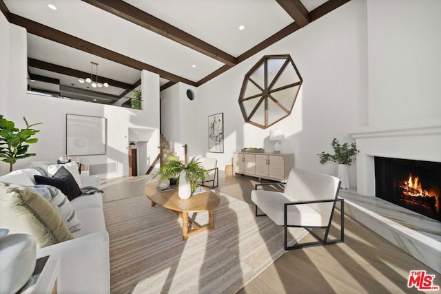 living room with beamed ceiling