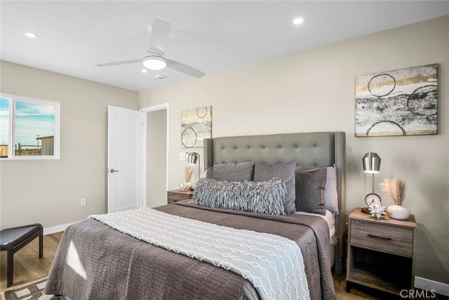 bedroom featuring ceiling fan and wood-type flooring