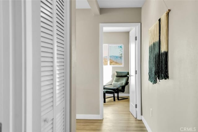 hallway with light wood-type flooring