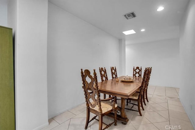 view of tiled dining space