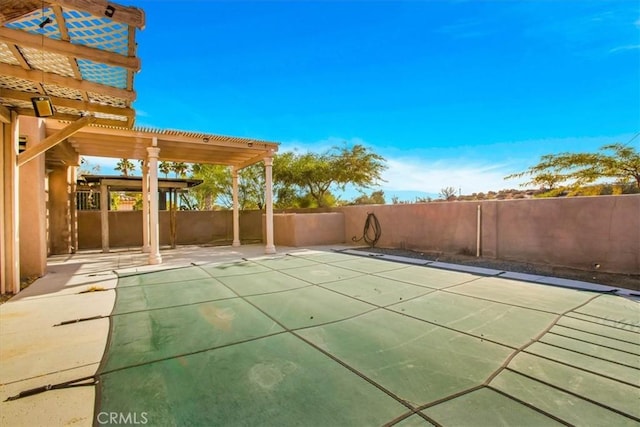 view of swimming pool featuring a pergola