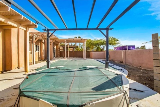 view of patio featuring a pergola