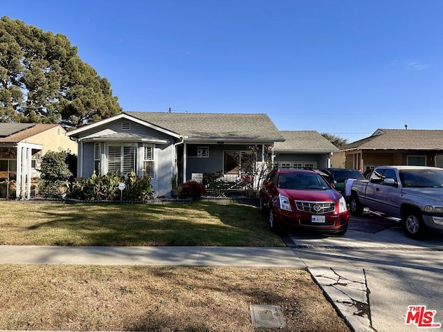 ranch-style house with a front yard