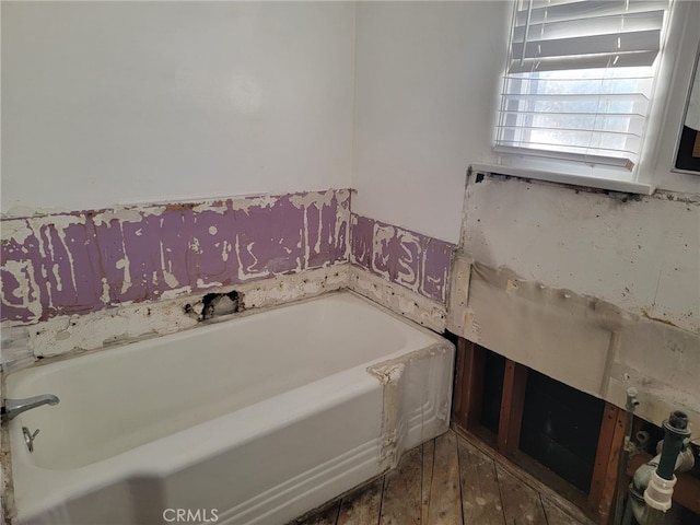 bathroom with a bathing tub