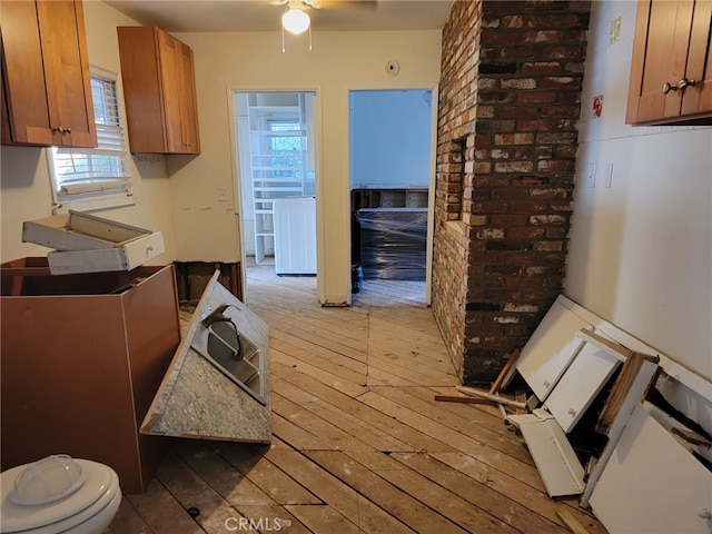 kitchen featuring ceiling fan and light wood-type flooring