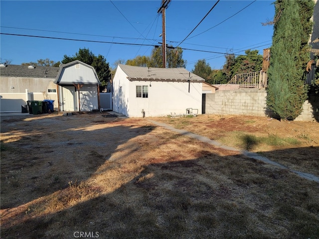 exterior space with a storage unit