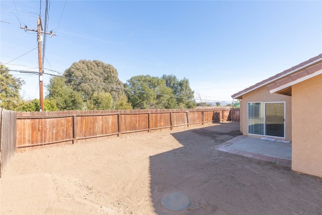 view of yard with a patio area