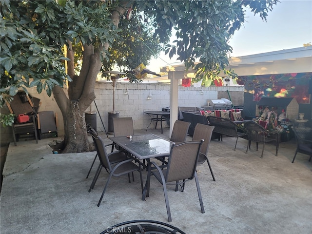 2214 Mark St, Santa Ana, CA 92703 - view of patio / terrace with an outdoor hangout area, outdoor dining space, and fence