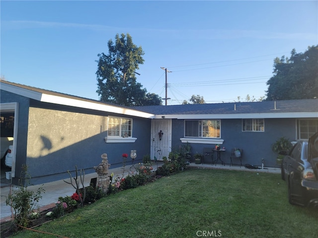 2214 Mark St, Santa Ana, CA 92703 - ranch-style home with a front yard and stucco siding