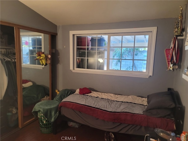 2214 Mark St, Santa Ana, CA 92703 - bedroom with lofted ceiling, a closet, and wood finished floors
