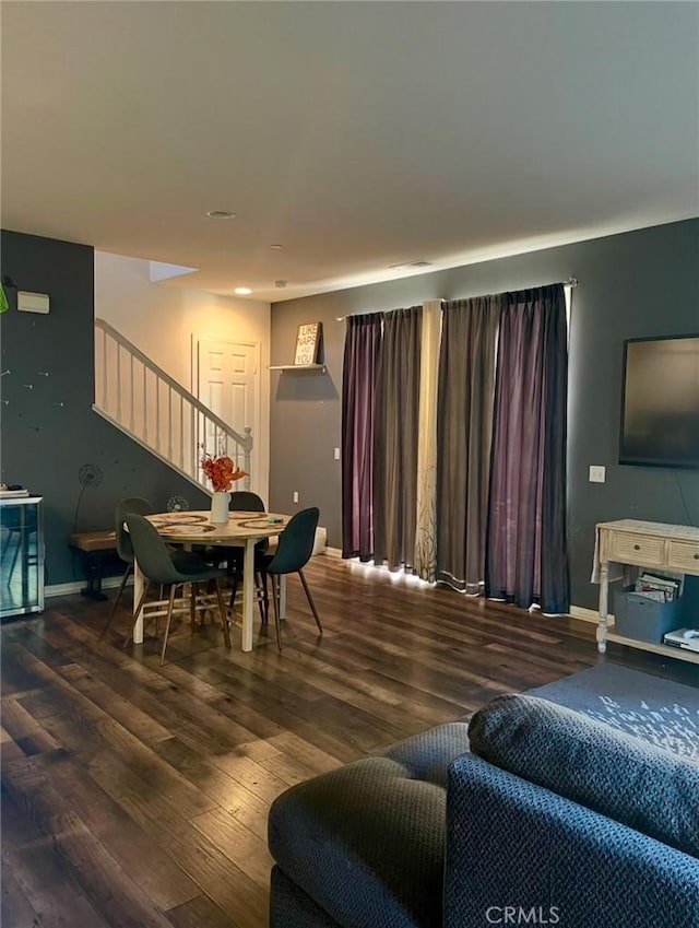 living room with hardwood / wood-style floors