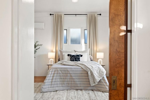 bedroom featuring hardwood / wood-style flooring