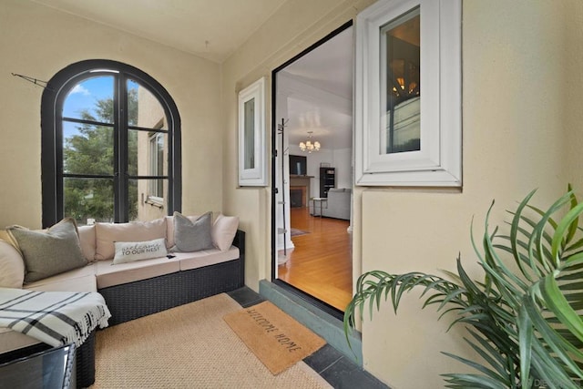 living room featuring a notable chandelier