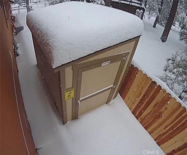 view of entry to storm shelter