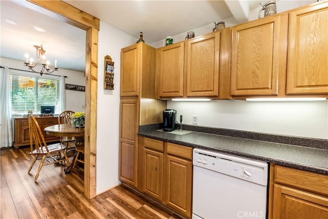 kitchen with dishwasher, dark hardwood / wood-style flooring, and a chandelier