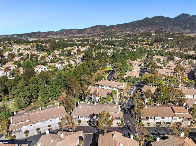 birds eye view of property featuring a mountain view