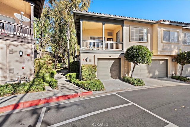 view of property featuring a balcony