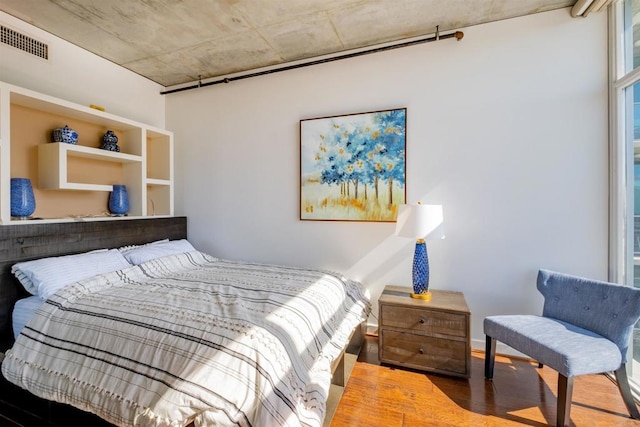 bedroom featuring hardwood / wood-style floors