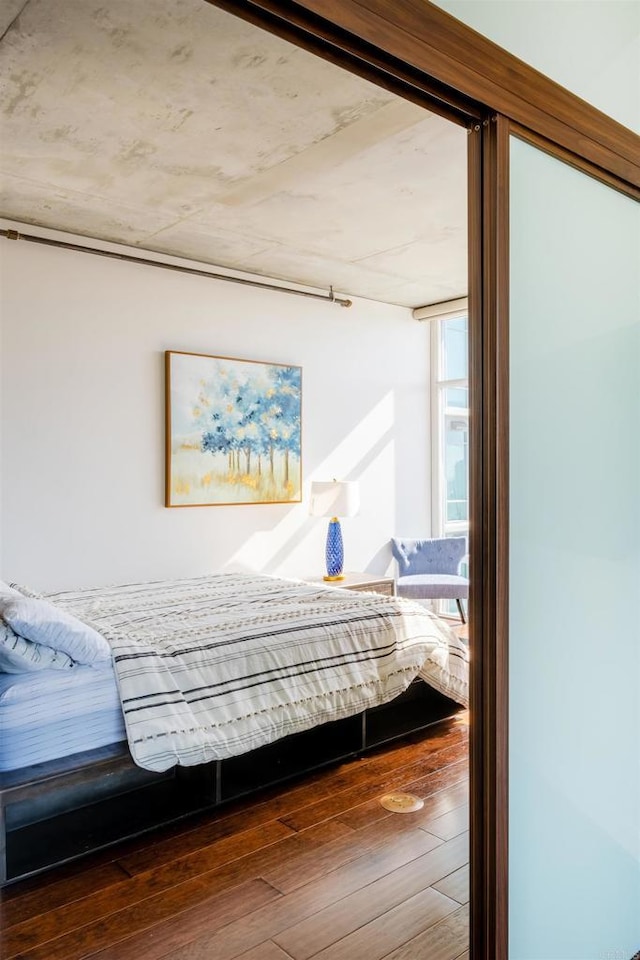 bedroom featuring hardwood / wood-style floors