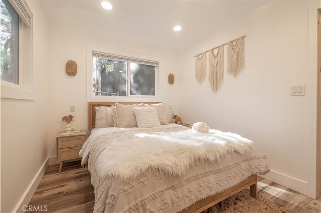 bedroom featuring hardwood / wood-style floors