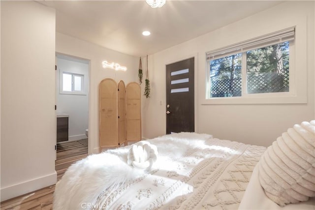 bedroom featuring light wood-type flooring