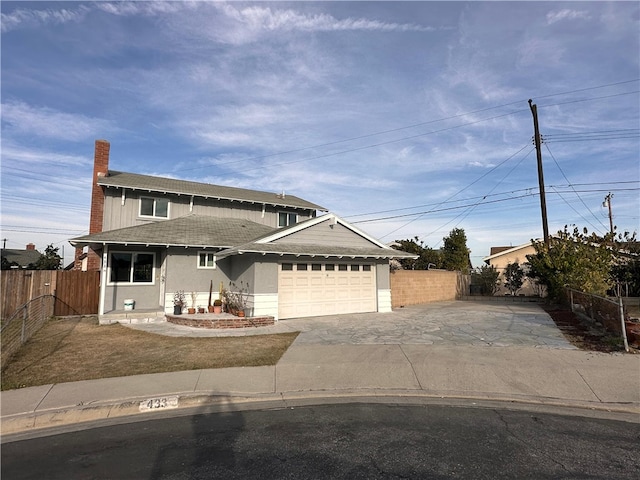 view of front of house with a garage