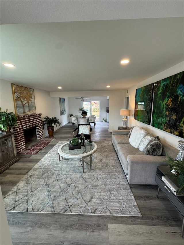 living room featuring hardwood / wood-style floors and a fireplace