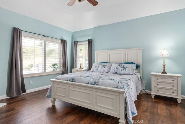 bedroom featuring ceiling fan and dark wood-type flooring