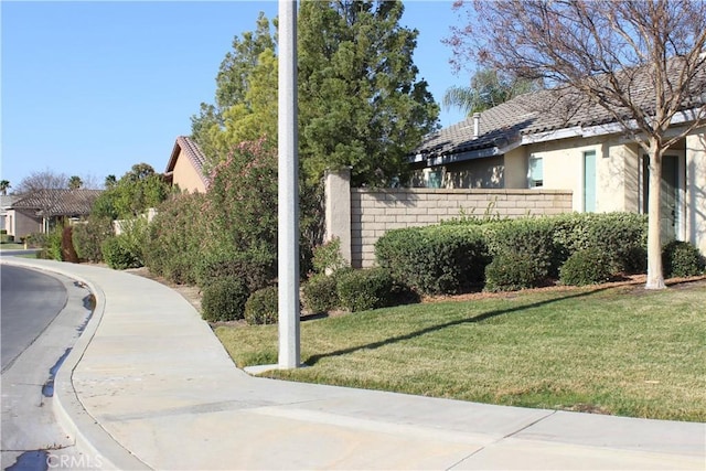 exterior space with a lawn