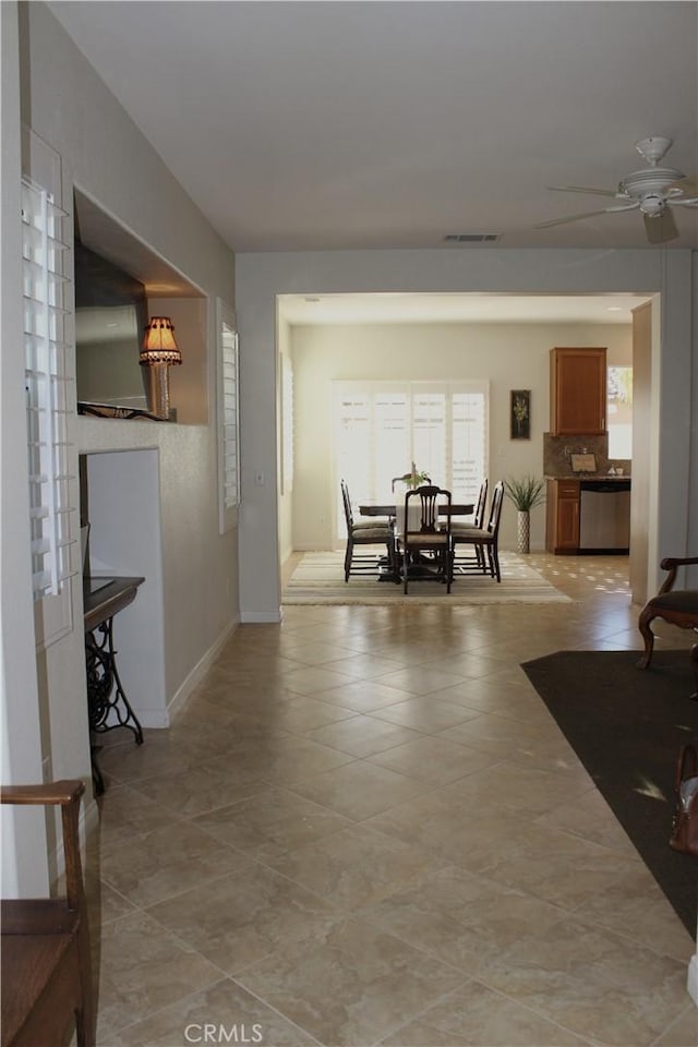 dining area with ceiling fan