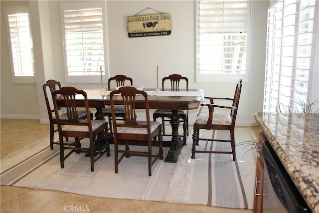 dining space with light tile patterned flooring