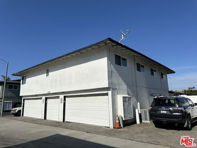 view of home's exterior with a garage