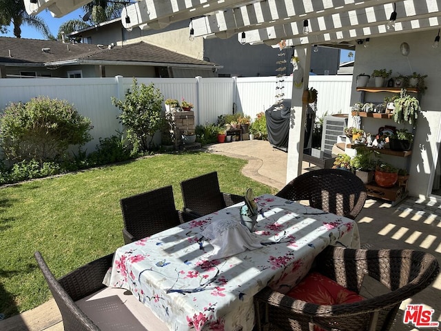 exterior space with a pergola and a patio