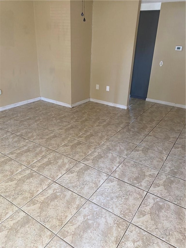 view of tiled spare room