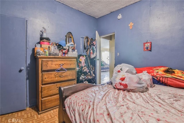 bedroom with a textured ceiling