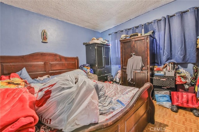 bedroom with a textured ceiling