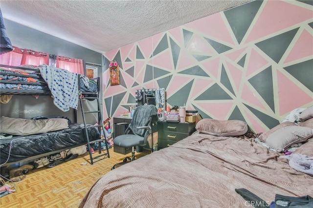 bedroom with a textured ceiling