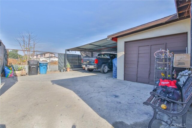 garage with a carport