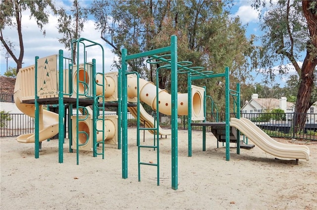 community jungle gym with fence