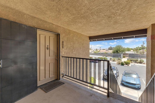 property entrance with a balcony