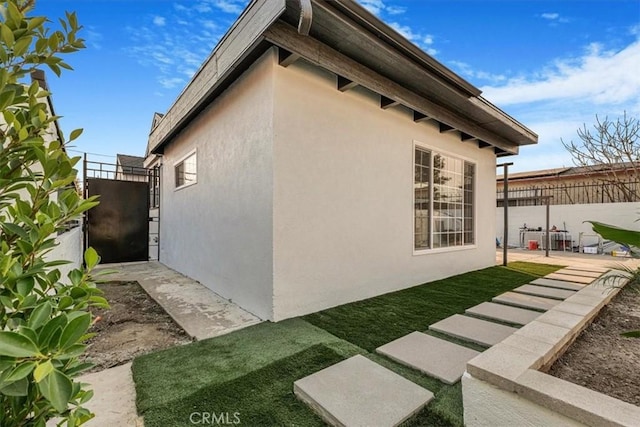 view of home's exterior with a patio area