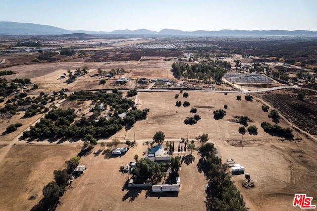 bird's eye view with a mountain view