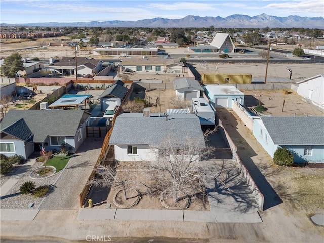 drone / aerial view featuring a mountain view