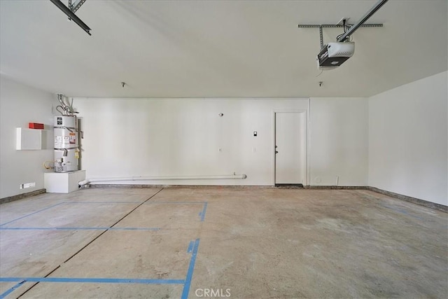 garage featuring secured water heater and a garage door opener