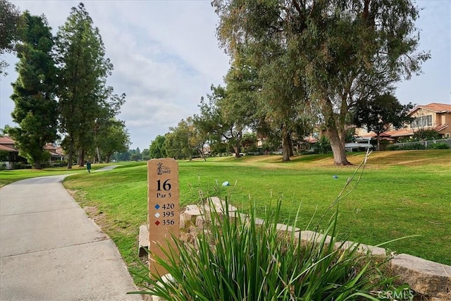 surrounding community featuring a lawn