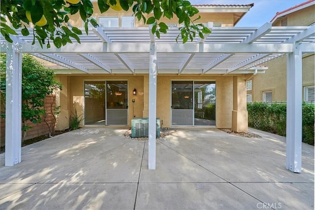 exterior space featuring a pergola and central AC